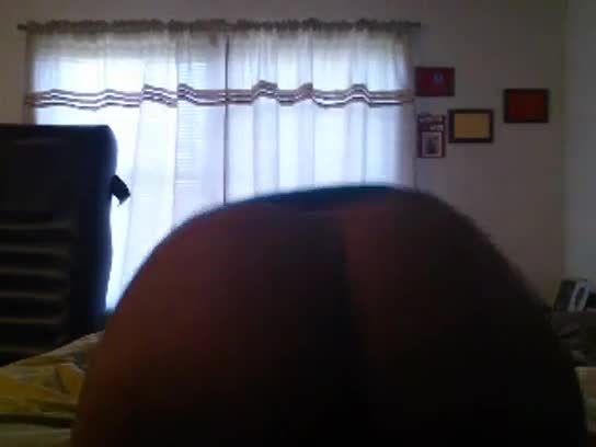 Black Ebony working in the bedroom
